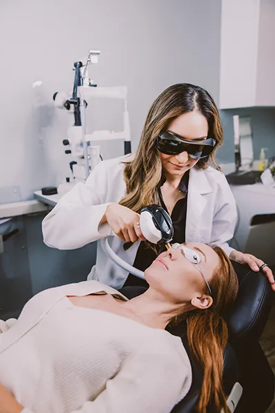 Dr. Balvinder Bharj performing Inmode Treatment on a patient